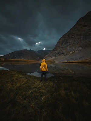 Back View of a Person in Yellow Hoodie Jacket Standing in Front of Mountain Lake ·, Alone In Nature, HD phone wallpaper
