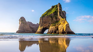 Rock Formations reflect in the water, Wharariki Beach, South Island of New Zealand. Windows Spotlight, HD wallpaper